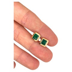 Pair of emerald earrings/ studs 18k gold studs bezel set 