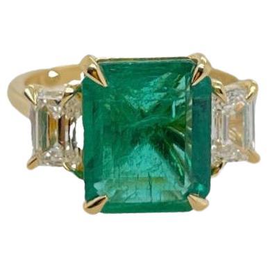 For Sale:  Custom made 3.50ct Emerald and diamond Trilogy style ring in 18ct yellow gold  2
