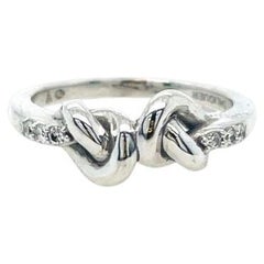Bracelet à double nœud en or blanc 18 carats avec diamants