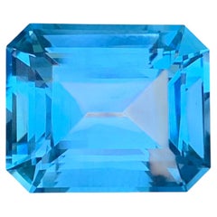 18.70 Carats Natural Blue Topaz Emerald Cut