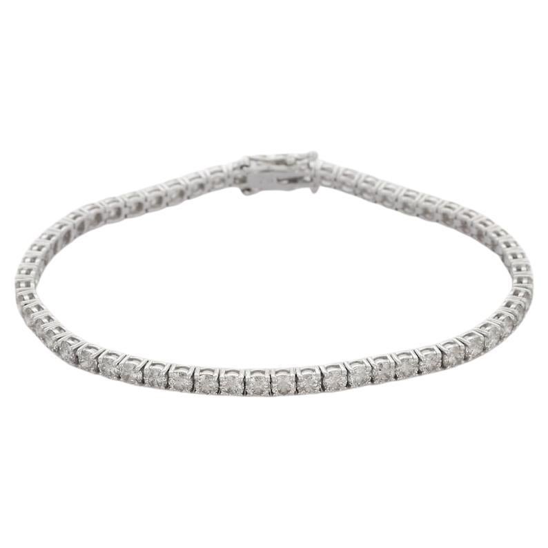 This Certified 6.01 CTW Diamond Tennis Line Bracelet in 18K gold showcases sparkling natural diamonds, weighing 6.01 carats. 
April birthstone diamond brings love, fame, success and prosperity.
Designed with round cut diamonds set in continuation to