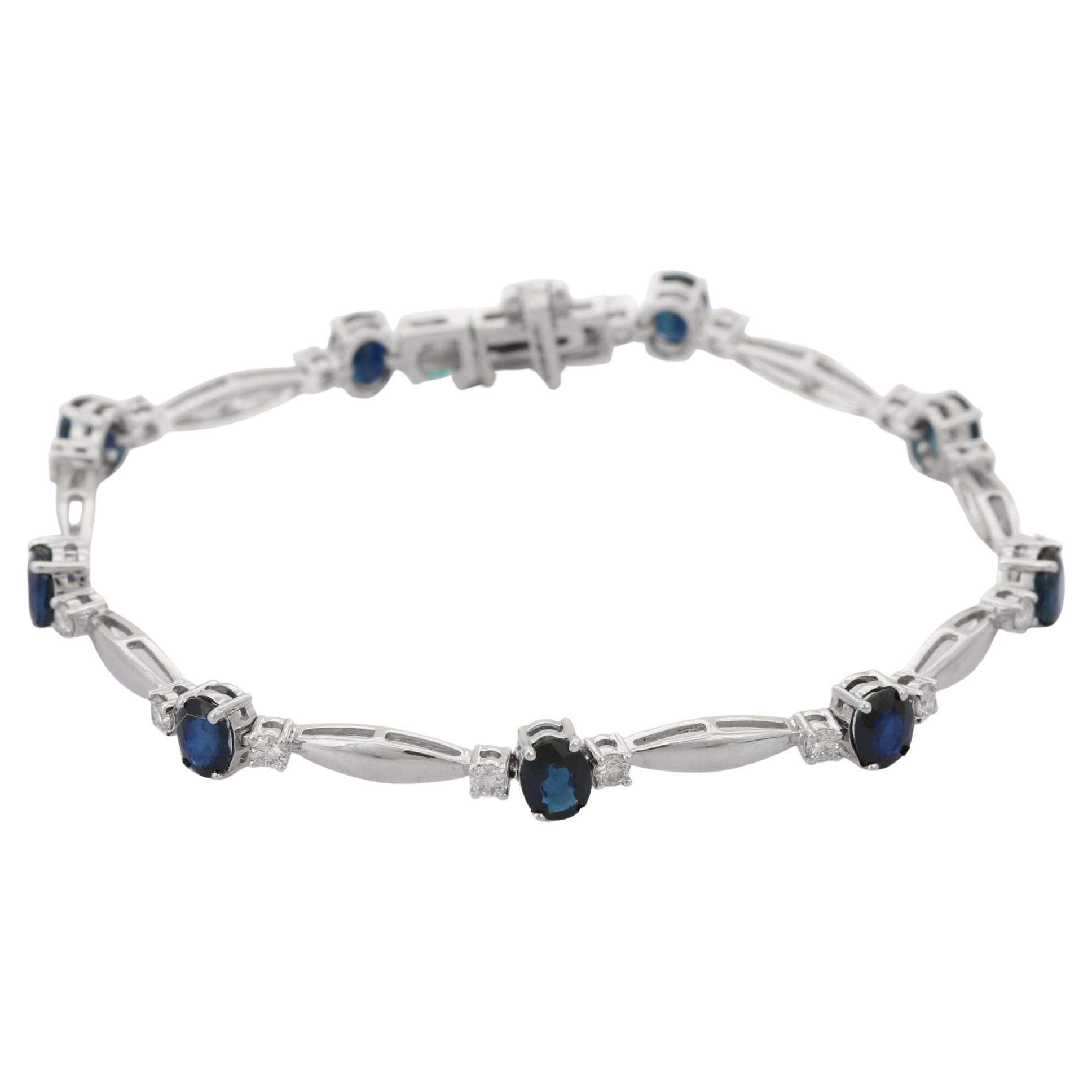 Moderne Bracelet en or blanc massif 18 carats avec saphirs bleus et diamants en vente
