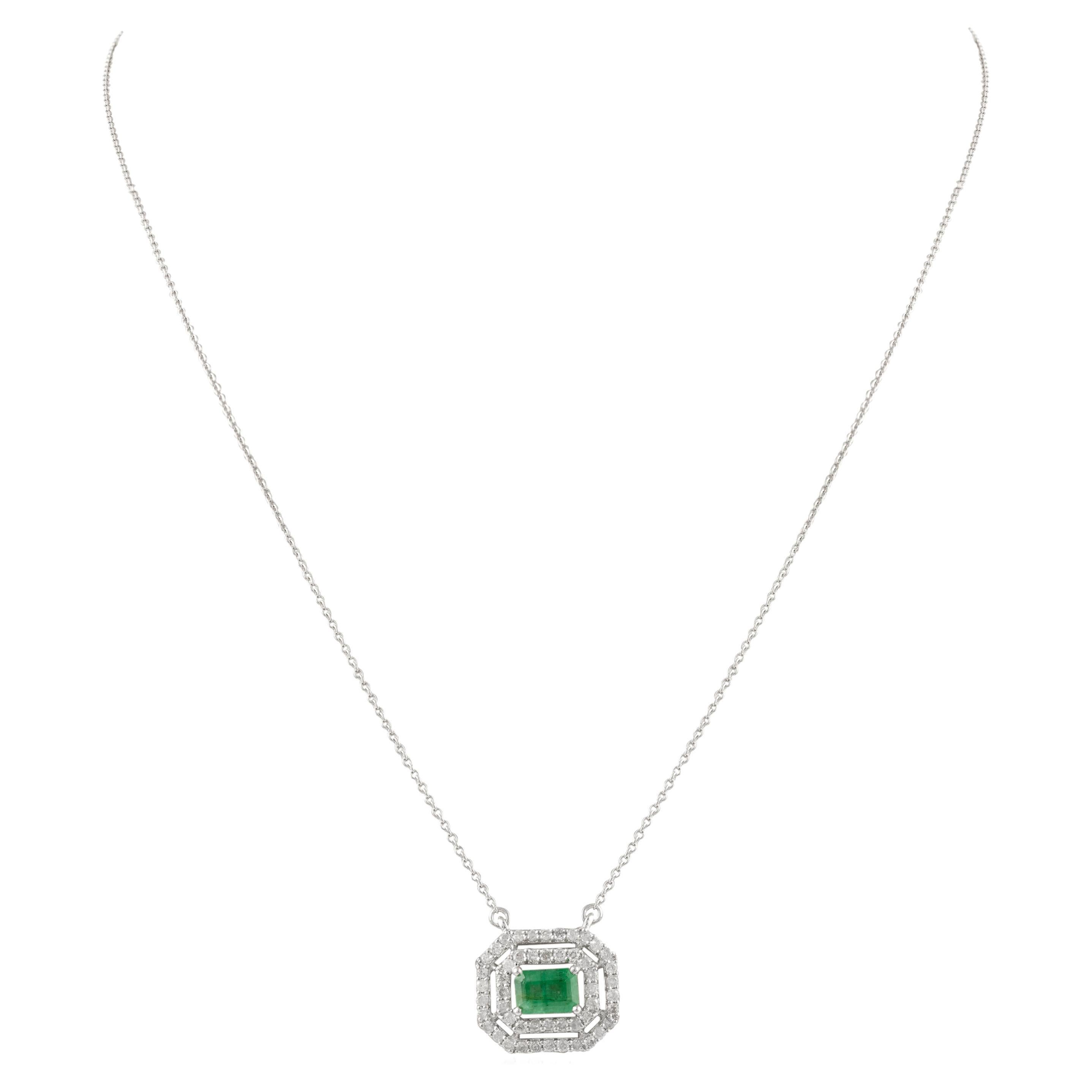 Brilliant Emerald Diamond Pendant Necklace with Chain in 14K Gold studded with octagon cut emerald and round cut diamonds. This stunning piece of jewelry instantly elevates a casual look or dressy outfit. 
Emerald enhances intellectual capacity of