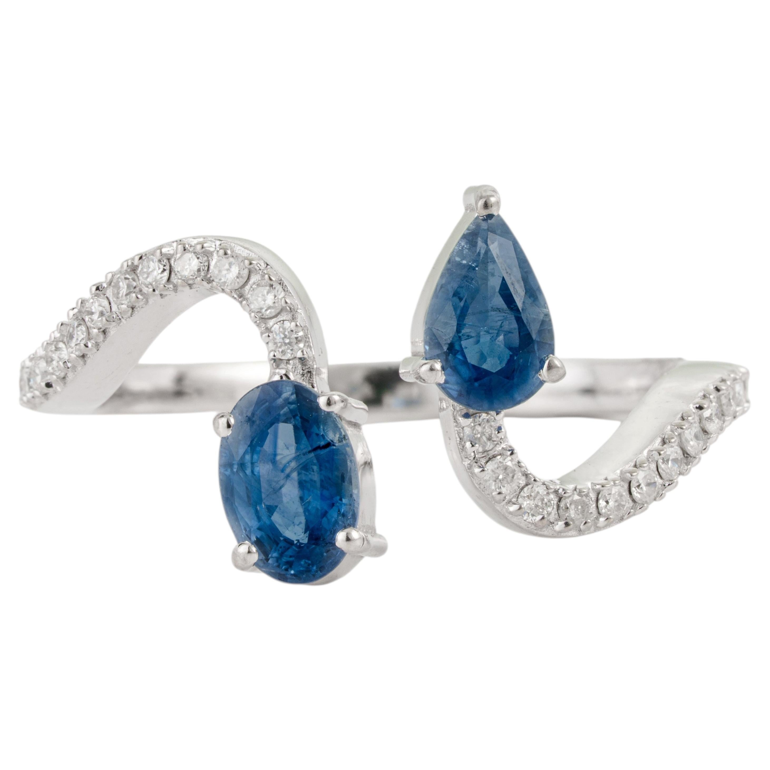 For Sale:  Pear & Oval Cut Blue Sapphire & Diamond Bypass Toi et Moi Ring in 14K White Gold