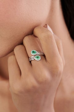 Contemporary Double Pear-Shaped Emerald & Diamond Halo Bypass Ring in 14K Gold