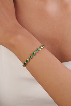 Elegantes Tennisarmband aus natürlichen Smaragden in Tropfenform (7,8 Karat) in 14-karätigem Gelbgold