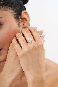 14K Yellow Gold 1.18 ct Oval Cut Paraiba Tourmaline & Diamond Double Halo Ring