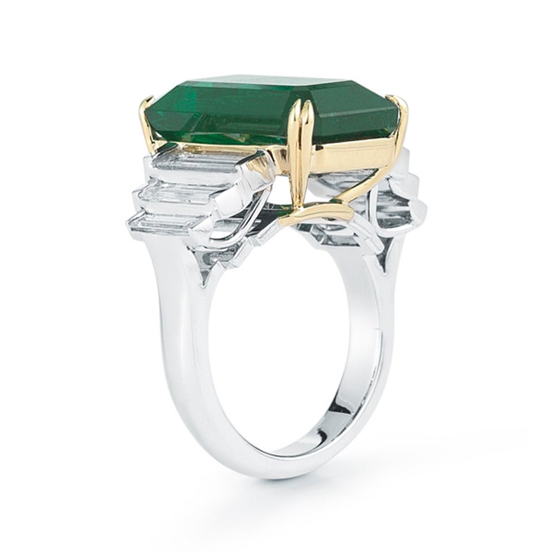 Zambian Emerald cut Emerald Ring with E/VVS Diamonds