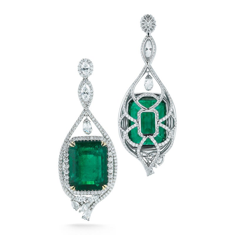 Product ID:01911
Model:TK MB 353
Metal:18K W
Gram Weight:37.60
Stock:1
Country Of Origin:USA

DIAMOND
•  Round: 6.74Ct.
•  Drops & Fancy Shape:5.15Ct.
•  Total Diamond Wt.: 11.89Ct.
GEMSTONE
Emerald : 53.87 Ct.
Dimension(mm):