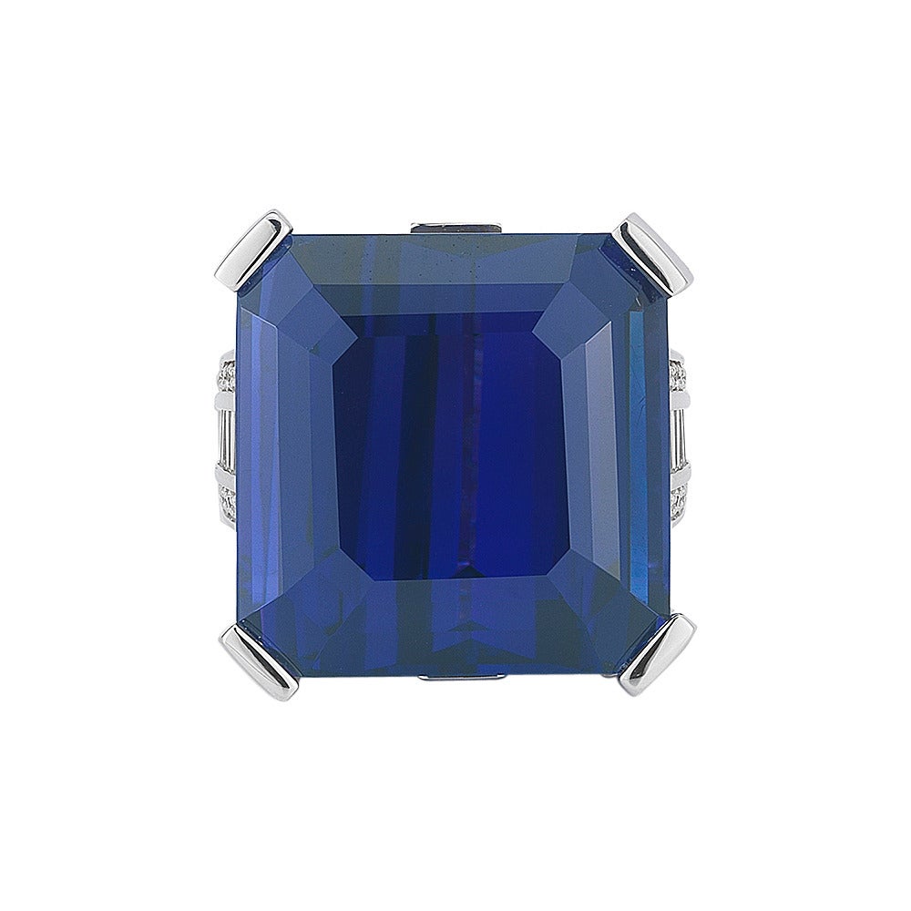 66.44 Carat Royal Blue Unheated Tanzanite Diamond Gold Ring For Sale