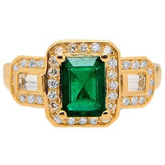Lovely Emerald-cut Emerald Diamond Gold Engagement Ring