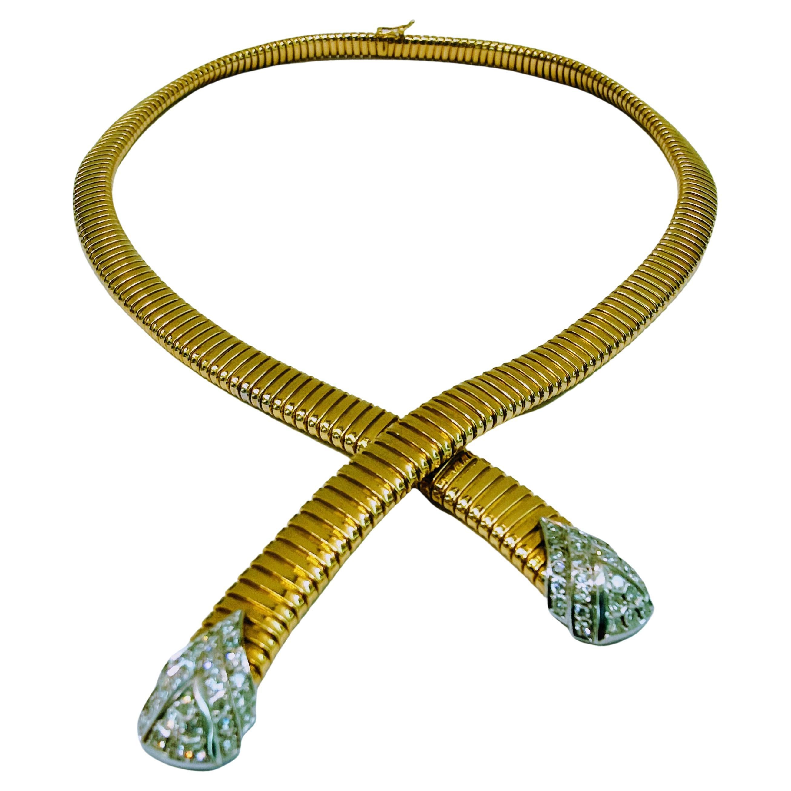 Beautiful yellow gold and white gold tubogas choker at 18kts. Its excellent fall makes it look magnificent to the eye with a perfectly concealed tongue closure and safety clasp. Set in grains with 56 single-cut diamonds and a total weight of 0.84