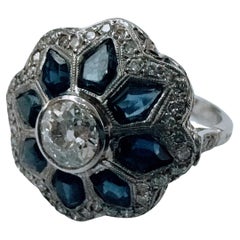 Art-Deco Platinum Ring Central Diamond Antique Cut with Sapphires and Diamond