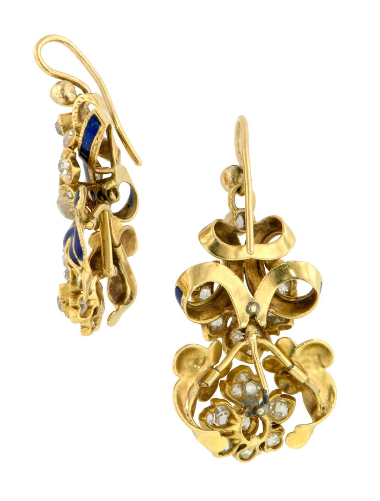 Victorian Diamond & Blue Enamel Earrings measuring app. 1 5/8 inches (including ear wire) x 7/8 inch wide, featuring Old Mine cut diamonds weighing app. 3.20ctw., and Rose cut diamonds measuring app. 1.5mm, in a ribbon & flower design with blue