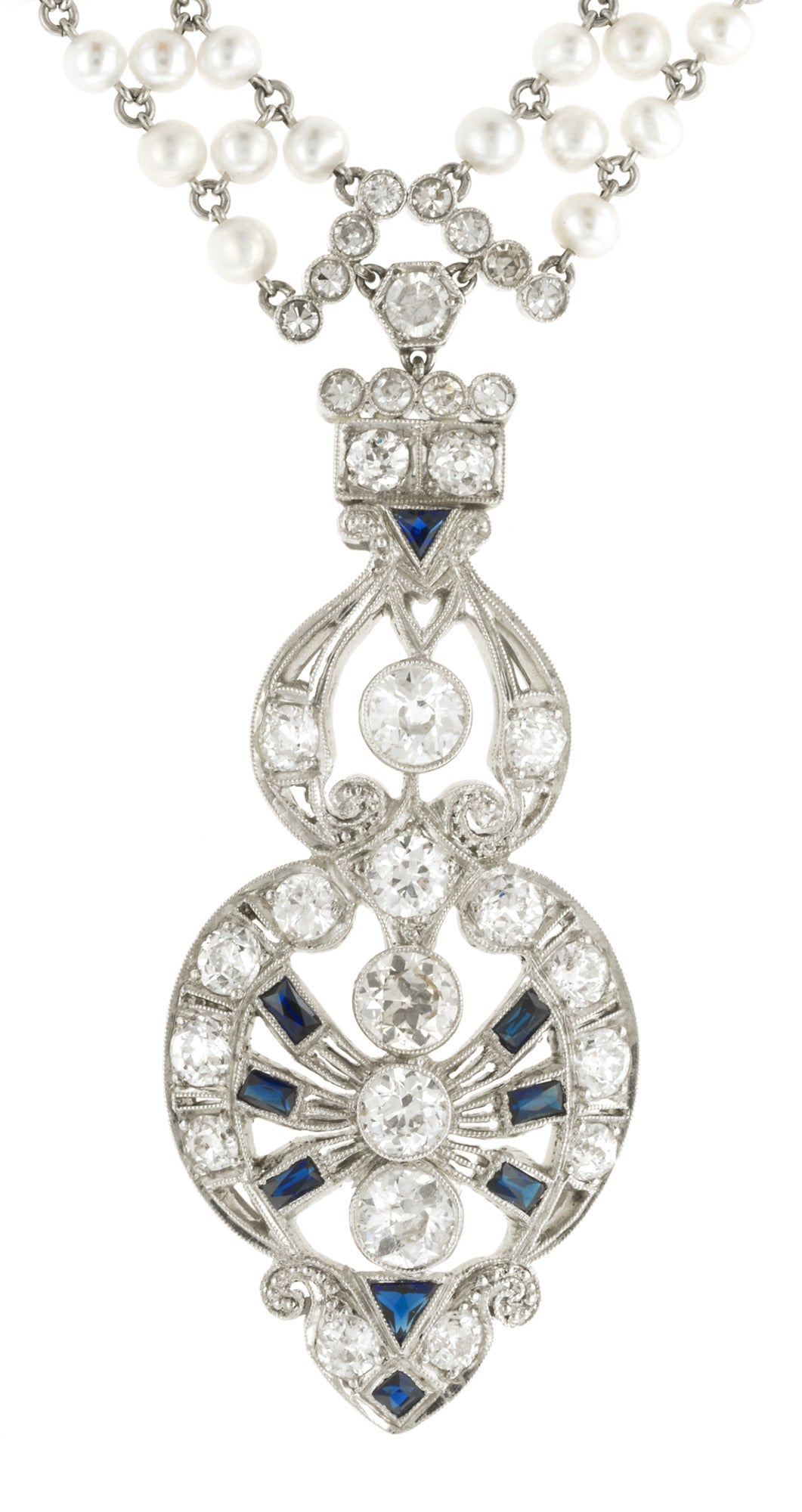 Art Deco Diamond, Sapphire* & Cultured Pearl Sautoir Necklace featuring a 2 inch pendant set with Old European cut diamonds weighing app. 2.00ctw. and calibre cut sapphires* measuring app. 2.0 x 1.5mm, suspended from a cultured pearl, (2.0mm) mesh