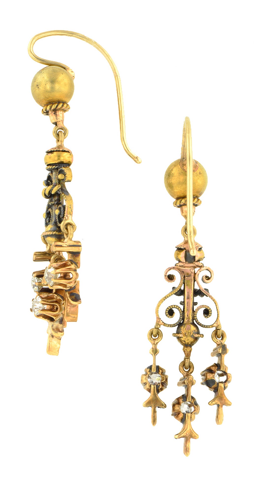 Victorian diamond drop earrings scroll wire work pendants with featuring a three diamond drop design, set with Old European cut diamonds weighing app. 0.42ctw., suspended from ball tops, fashioned in 14k. Circa 1880. Length 1 3/4 inches.