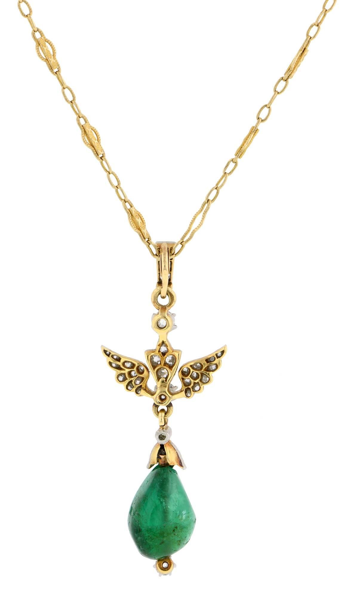 Vintage Austrian emerald & diamond wing pendant measuring app. 2 inches long (including bail) with emerald drop measuring app. 14mm x 11.4mm, suspended from a pair of wings set with Old European cut diamonds weighing app. 0.80ctw., fashioned in