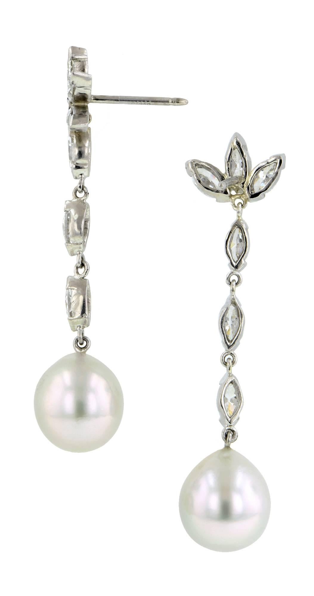 Vintage diamond & cultured pearl drop earrings featuring light gray cultured pearls measuring app. 10.3mm & 10.5mm, suspended from Marquise cut diamonds, all weighing app. 2.30ctw., fashioned in platinum. Last quarter 20th century. Length 1 3/4