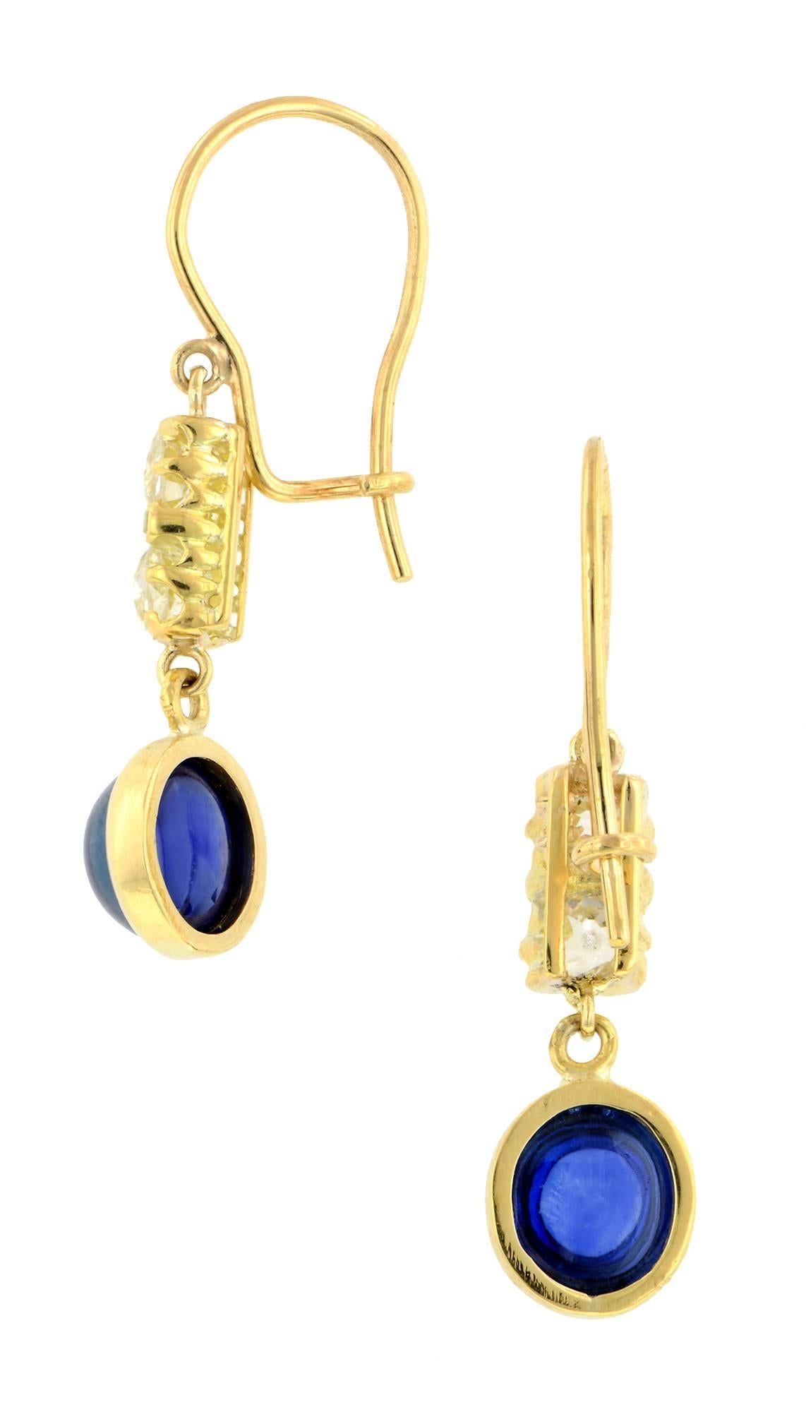 Sapphire & diamond drop earrings with two round cabochon sapphires weighing app. 3.50ctw., and measuring app. 6.0mm, suspended from tops set with four Old European cut diamonds weighing app. 0.70ctw. and four rose cut diamonds measuring app. 1.4mm,