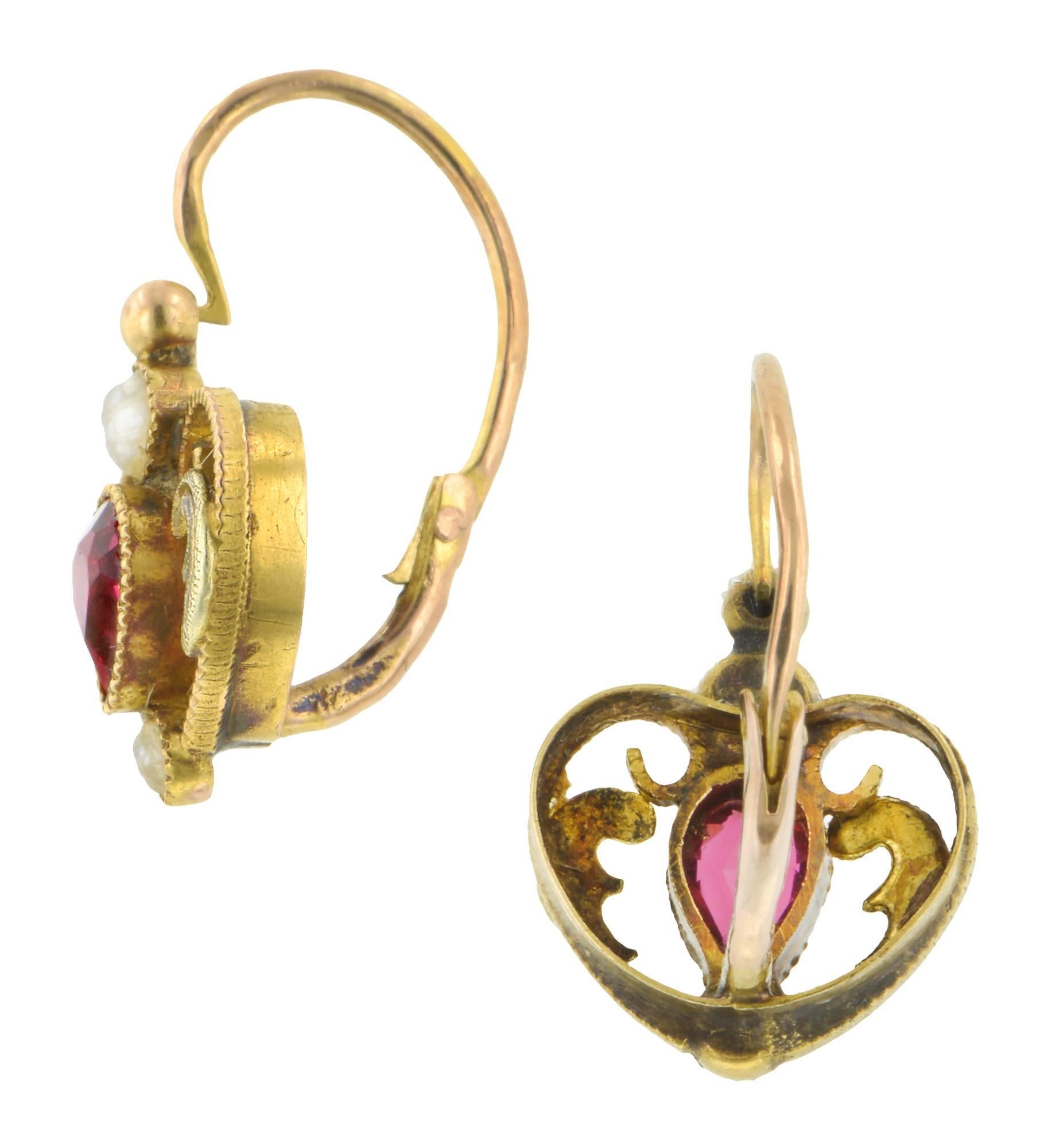 Victorian spinel & seed pearl earrings measuring 5/8 x 3/8 inches in overall dimensions; centering two collet set, Pear faceted, red spinel measuring 4.22 x 2.98 x 2.0mm; on average; with a combined approx. weight of 0.34ctw, along with a total