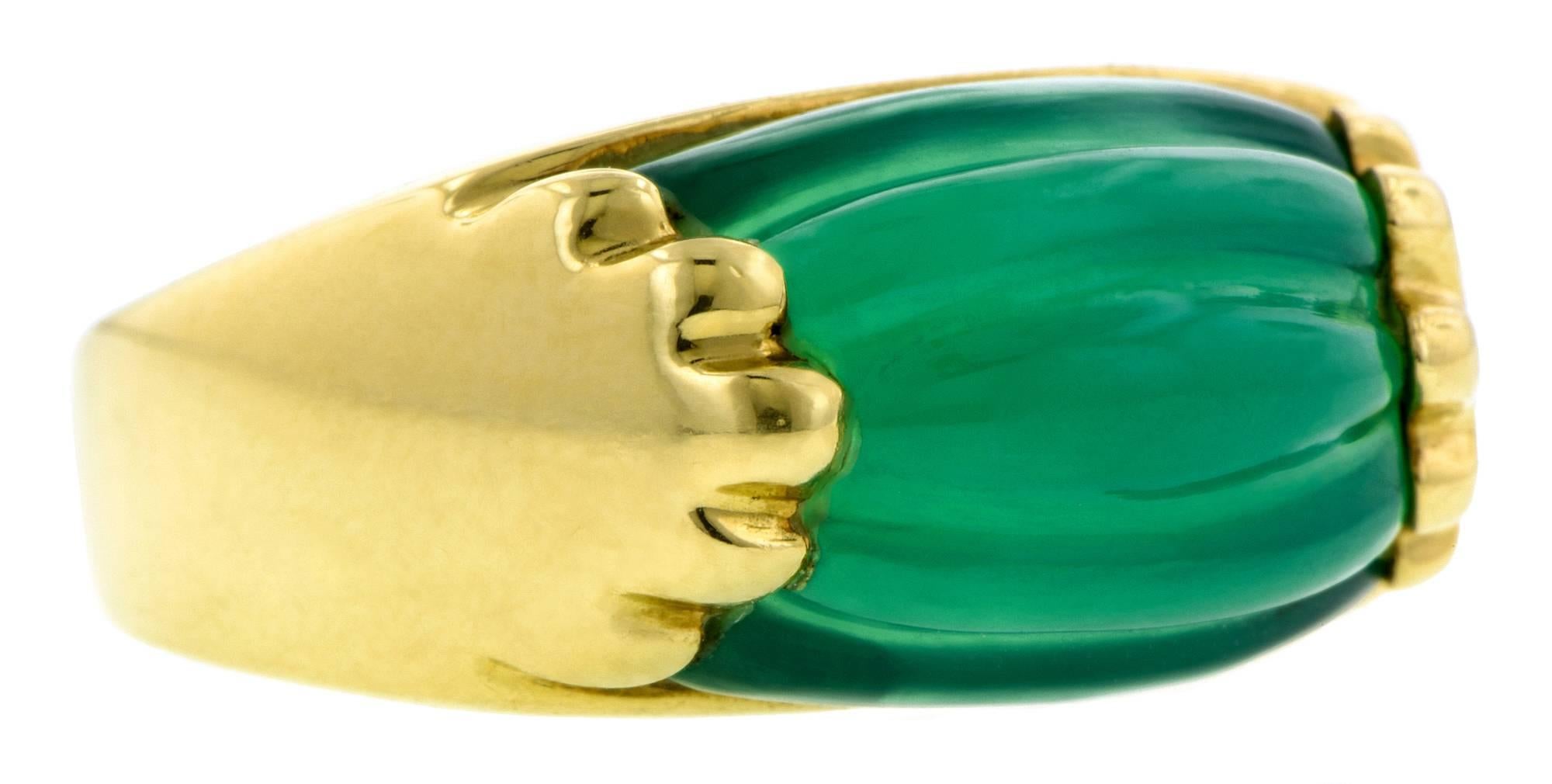  Bulgari Tronchetta Ring with green onyx measuring approx. 9.5 at widest, with a custom cut fluted green onyx conforming to the contours of the mounting, fashioned in 18k. Stamped "BVLGARI" & "750" with additional numbers