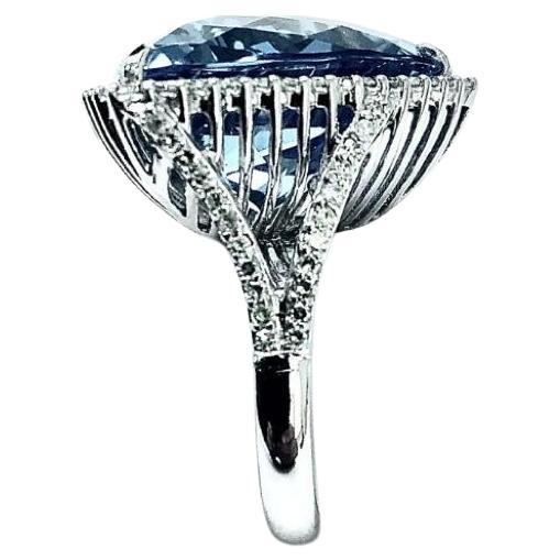 Contemporary Swiss Blue Topaz 26 Carats with Pave Diamonds Ring For Sale