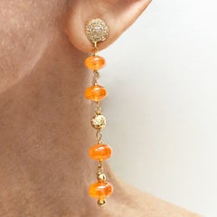 Boucles d'oreilles en spessartite orange avec or et diamants