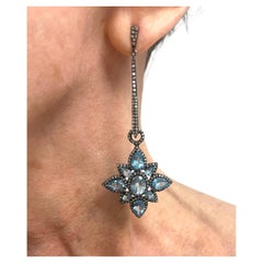 Boucles d'oreilles Paradizia en topaze bleue suisse pavée de diamants