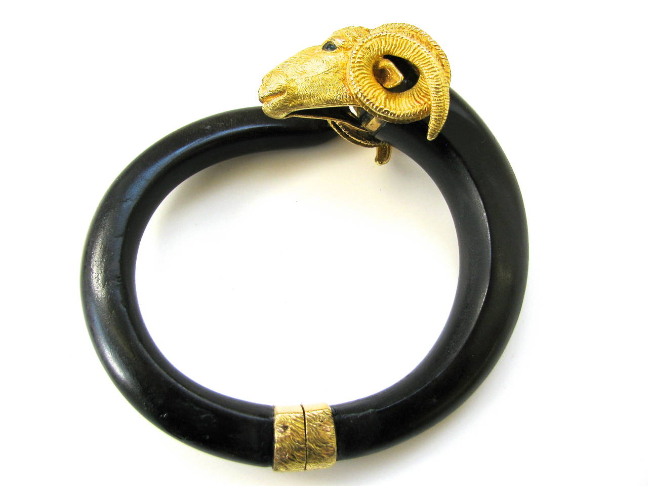 A Charming French bracelet by Gay Freres. The carved horn bracelet with a 1