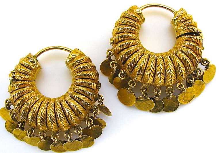 A pair of Yellow gold earrings from the Middle East. The 1 1/2