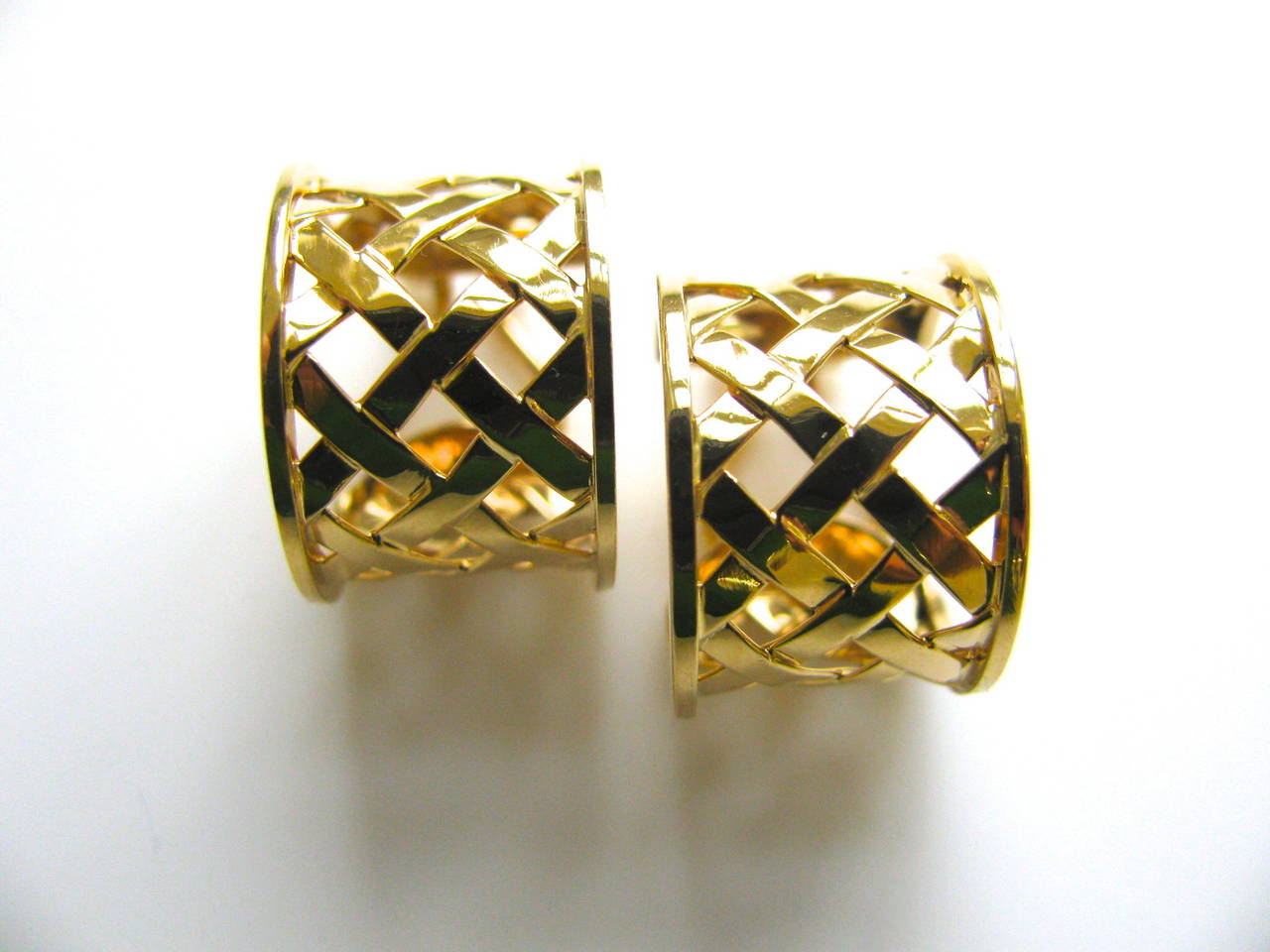 A smart pair of yellow gold earrings by Fulco di Verdura. The 5/8