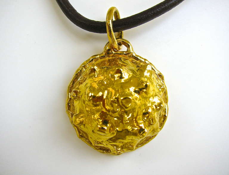 A handsome pendant by Jean Mahie. The 22K 1 1/2