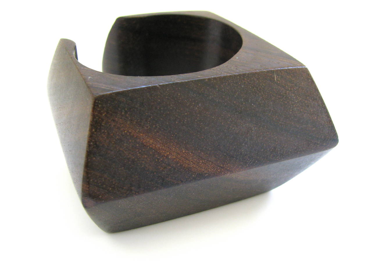 A Dramatic wood bracelet by Catherine Noll. The 2' w x 1 1/4