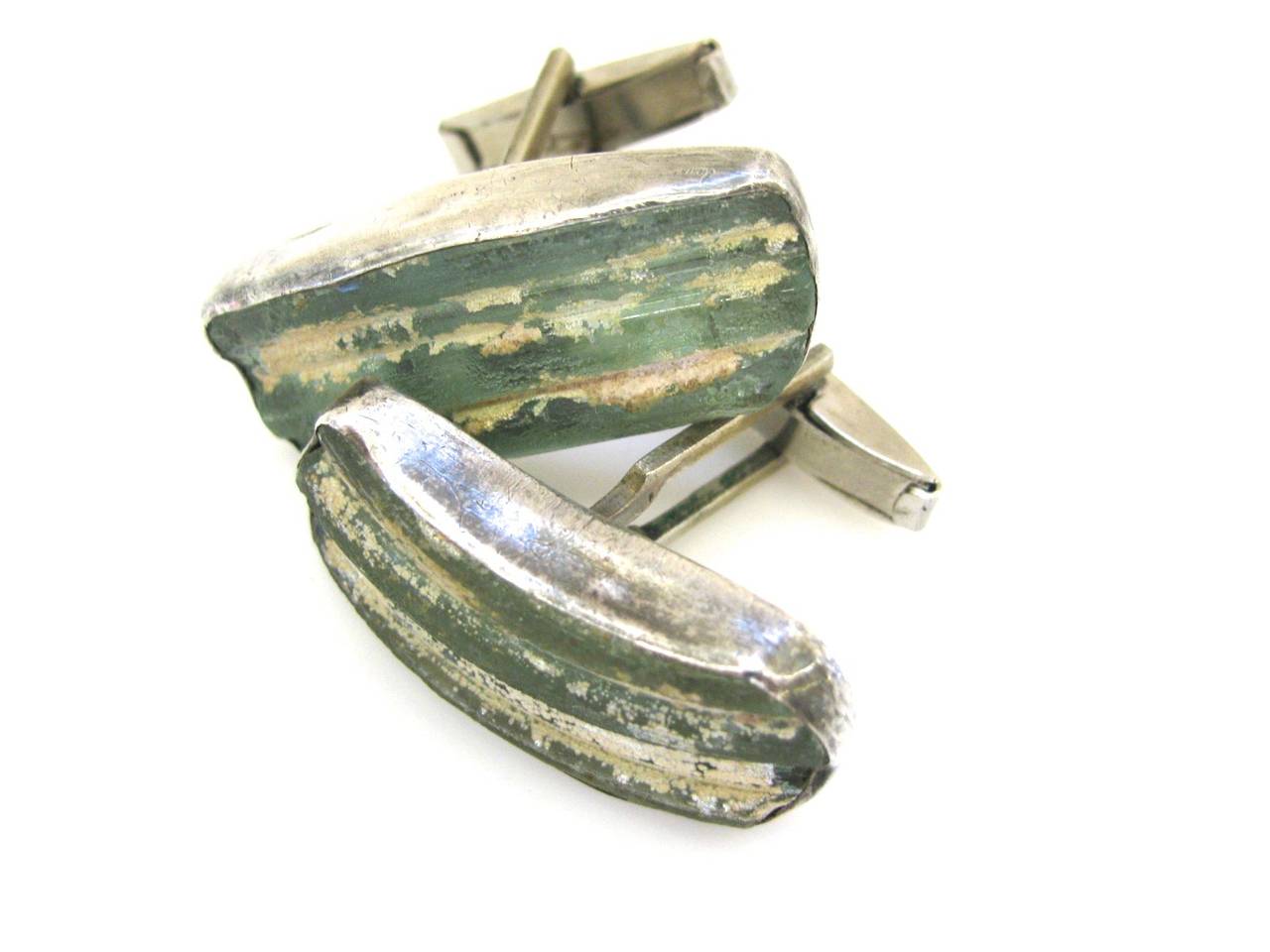 An interesting pair of Roman Glass cuff links. The 1