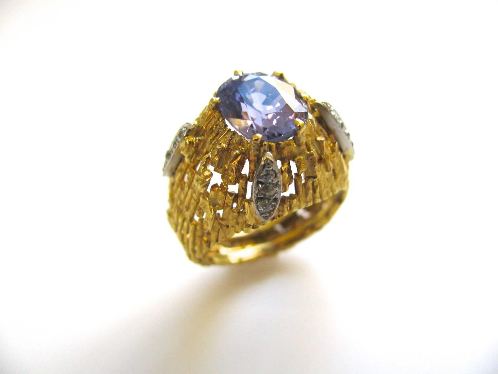 A beautiful Andrew Grima Lavender Sapphire Ring. The 5/8
