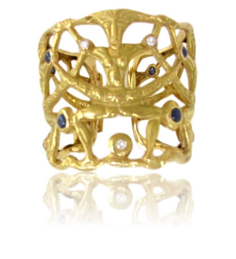 Sculptural gold and sapphire bracelet in the style of Franco Cannilla. The 2 1/2