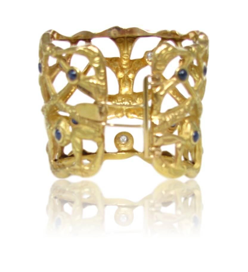 Artisan Sapphire Diamond and Gold Tribal Motif Cuff Bracelet Circa 1960