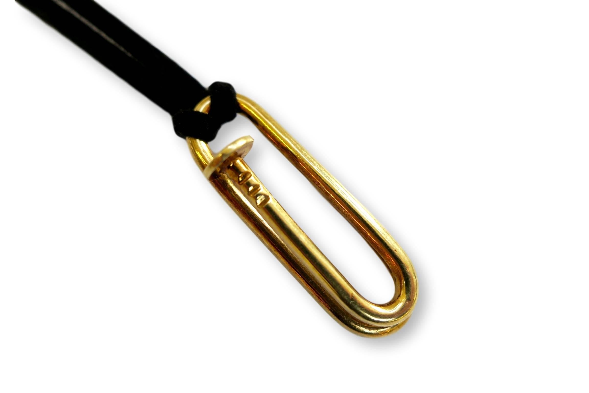 Vintage Cipullo Juste un Clou style pendant. A 1 1/2" 18k yellow gold bent "nail".  Use this multi-functional jewel as a gold money-clip or paper-clip , not that extravagant.. then try it the way we like it as a pendant!  Looks great