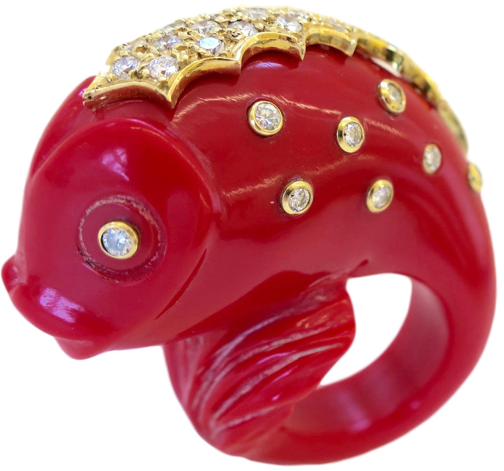Vintage gold and diamond cocktail ring with fish motif by Italian designer Antonia Miletto. The 1.50 inch h x 1inch wide hand-carved red resin ring  in the shape of a dolphin with an 18k yellow gold and pave diamond fin, enhanced with bezel set