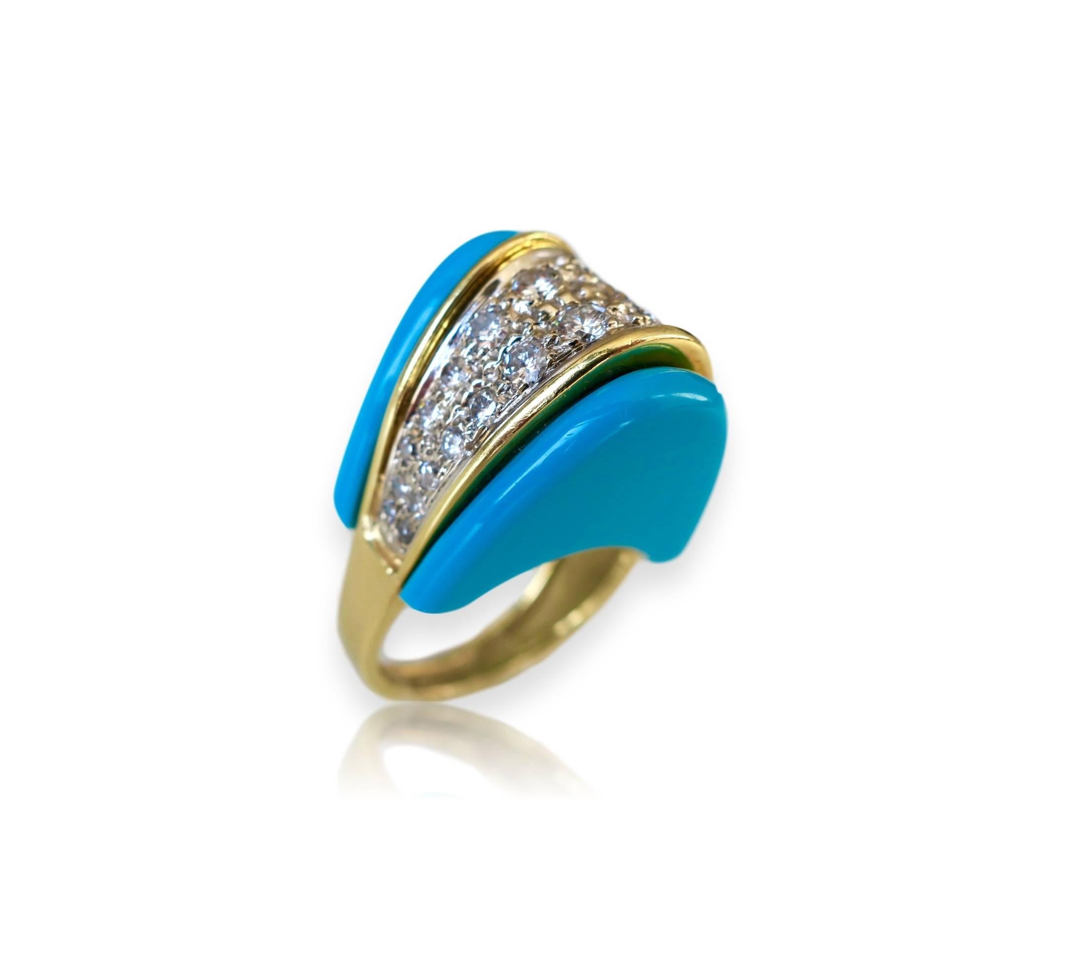 Gold and diamond cocktail ring. The 1 1/2 x 3/4" bright sky-blue and 18k yellow gold  bullet-shaped ring with one carat of round white diamonds. Showy and fun. *Turquoise has not been tested for natural vs lab created. Ring sits 1/2" high.