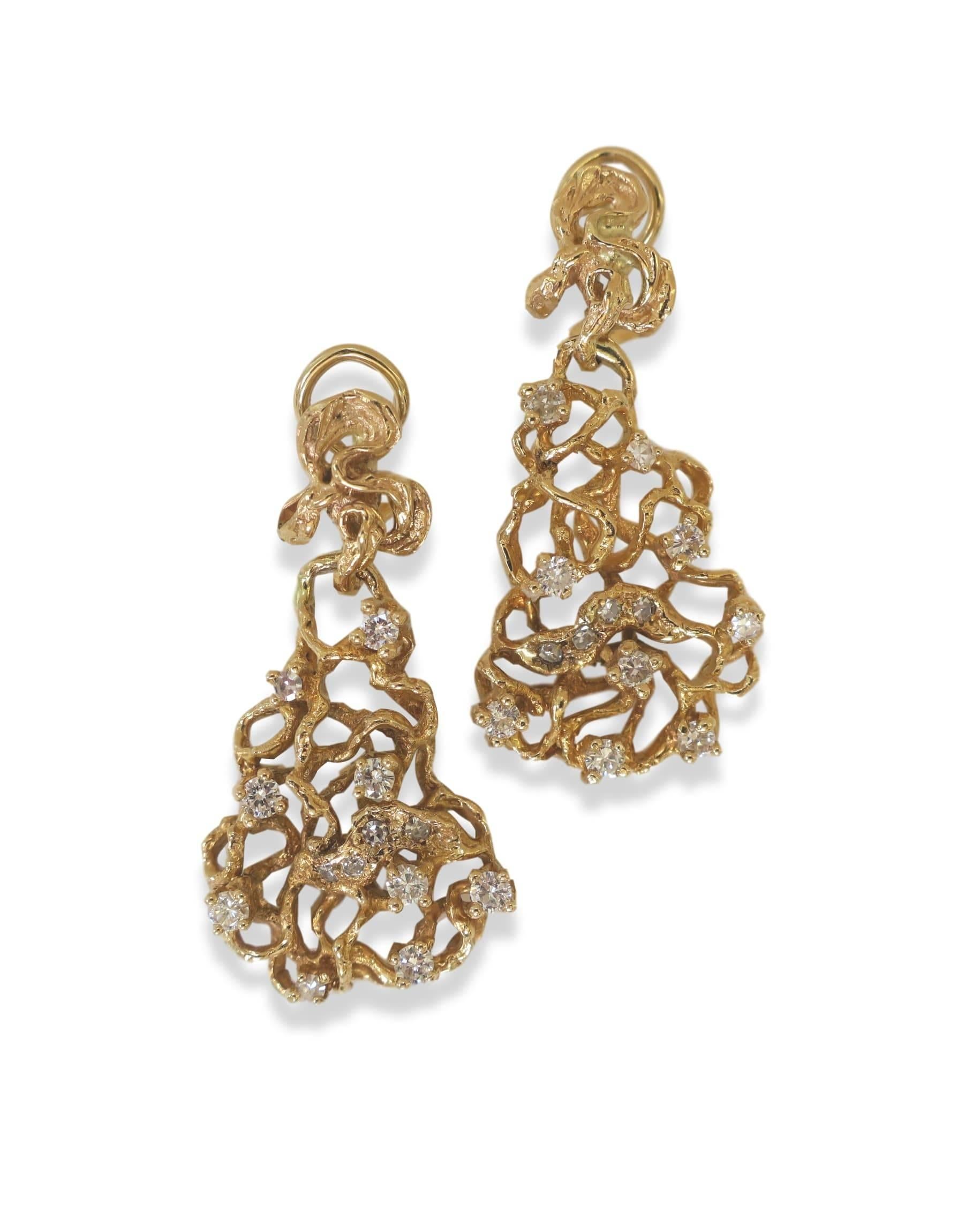Modernist gold and diamond earrings in the style of Arthur King. The textured finish 14k, 1 3/4
