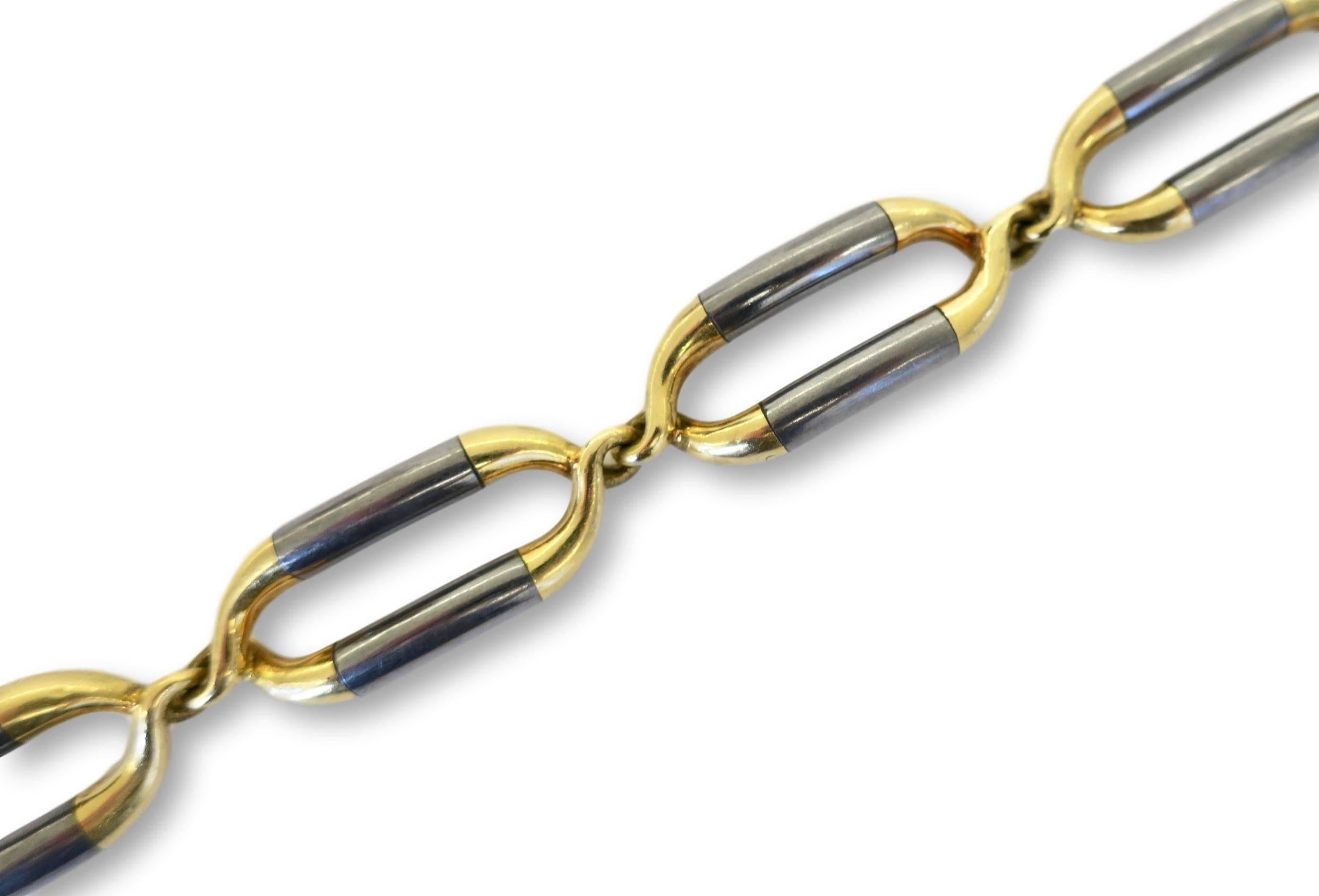 VCA Boutique 1970's chain bracelet . The 7 1/4"  18k and Steel bracelet made up of six oval links. Designed by Gay Freres for Van Cleef and Arpels in the 70's , this hefty unisex bracelet is easy to wear and a nice departure from a more