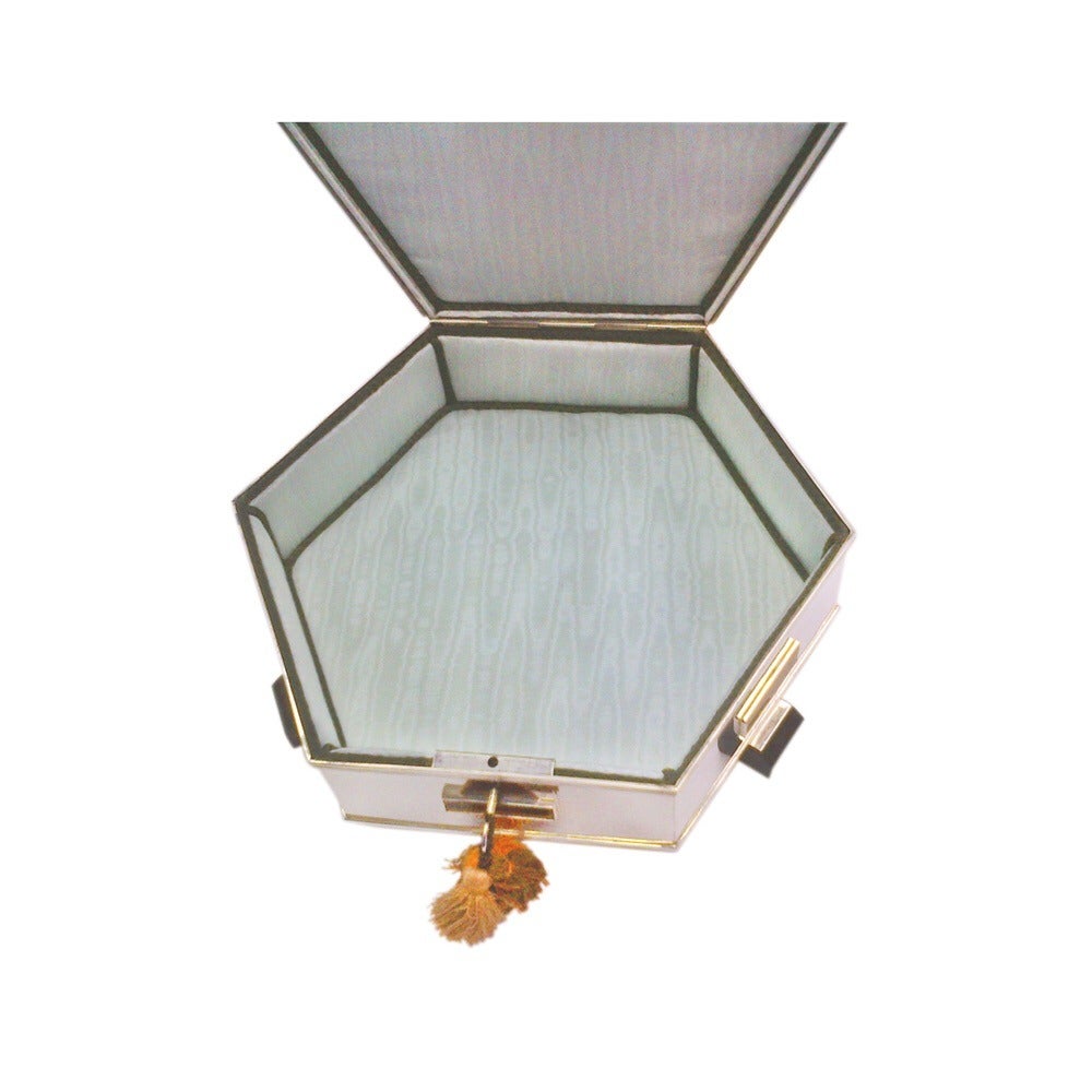 Maison Cardeilhac French est 1804 

A Lovely Art Deco Silver and tiger eye  jewelry box
Geometric shape 
10inch by 10inch 4inch tall
mid 20 ct
Hallmarked Cardeihac, see photos.