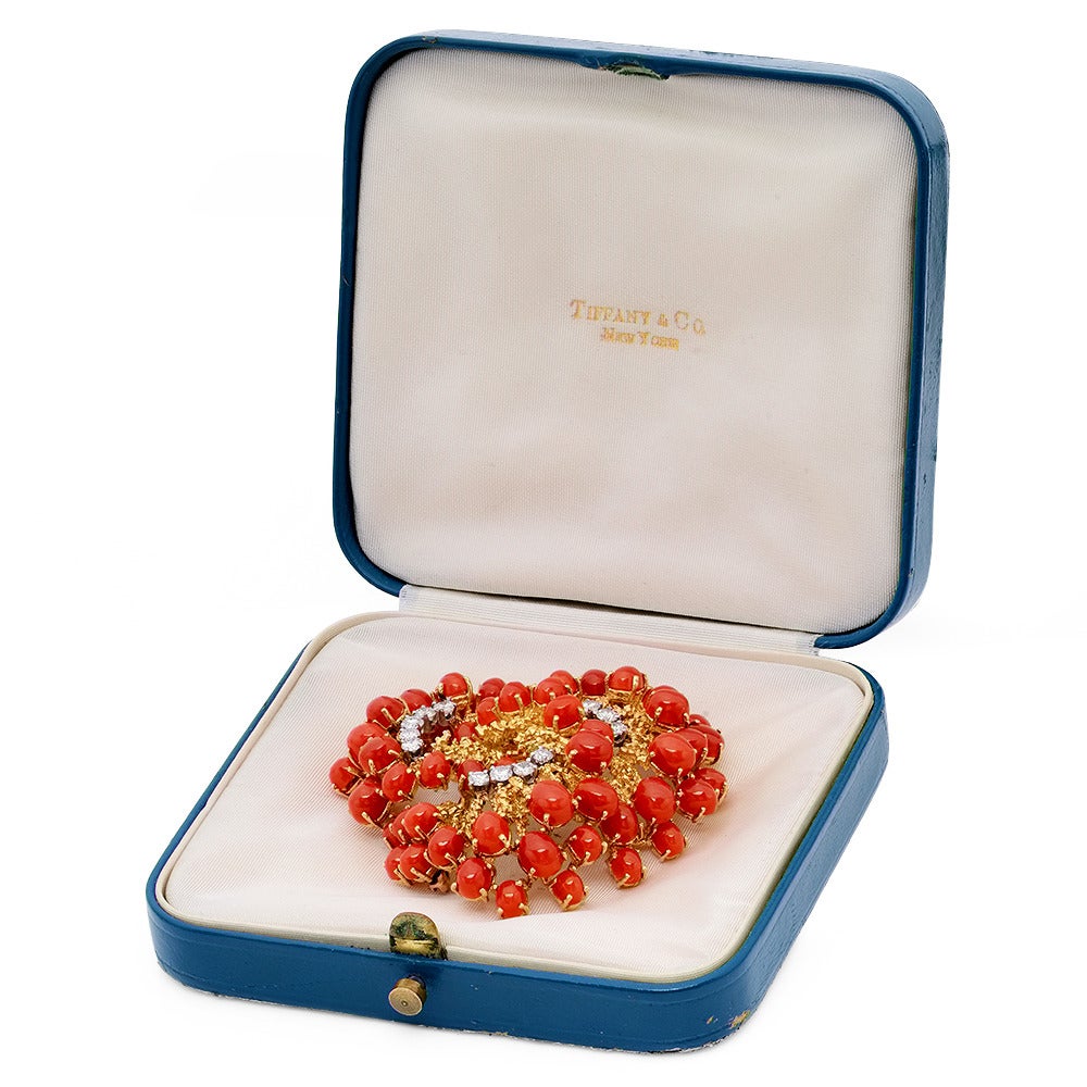 Tiffany & Co Coral and Diamond Brooch, multiple cabochon fine red coral set in this original T&Co brooch from the 1960's. 1.20cts tw. of fine quality doimonds.