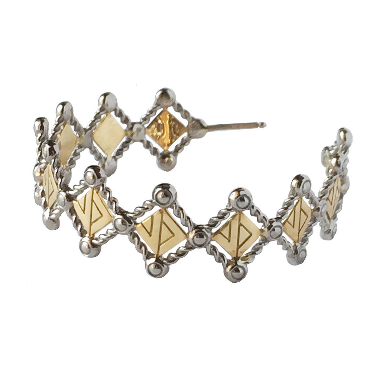 These glamorous Louis Vuitton 18K two-tone gold large hoop earrings are one of the memorial pieces among the maison’s fine jewelry line called 