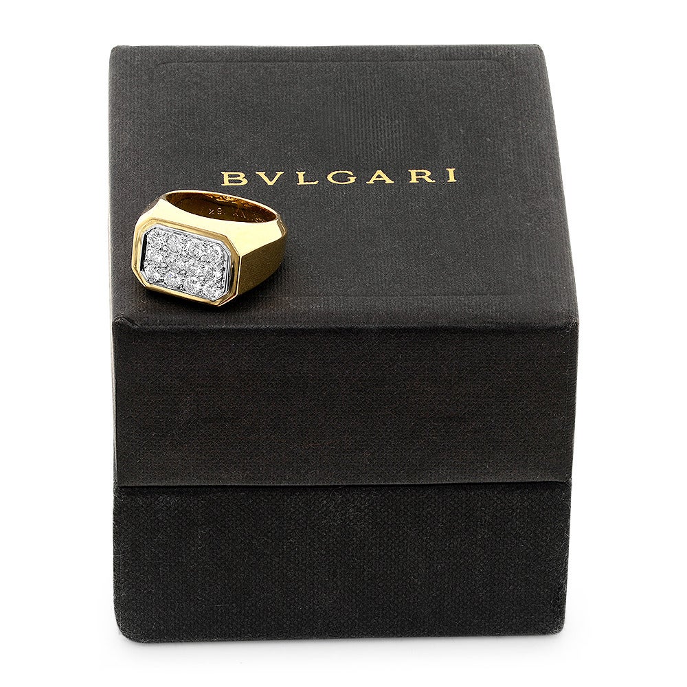 Bvlgari NY 1980's Diamond  ring. The ring is set with 12 round diamonds .75 cts total weight. Signed Bvlgari NY 18k Size 5.5