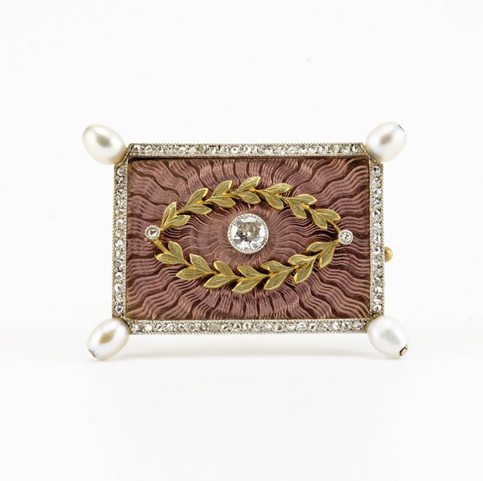 A Fabergé diamond- and pearl-set gold and guilloché enamel brooch, workmaster August Holmström, Saint Petersburg, circa 1900, with original scratched Fabergé inventory number 93517. Rectangular, the four corners set with pearl finials, enameled