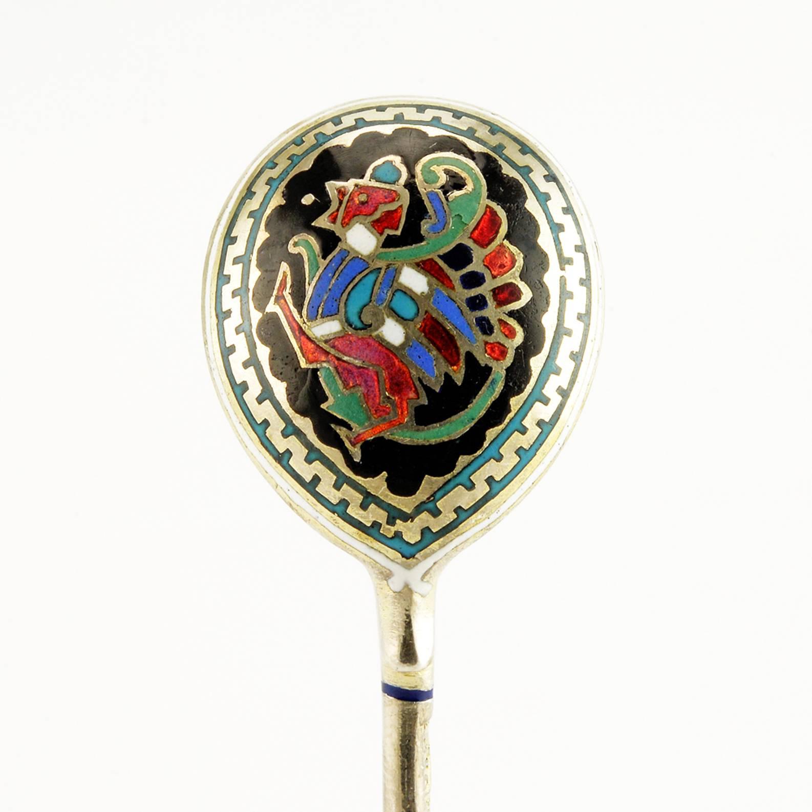 A rare set of twelve Russian silver and champlevé enamel demitasse spoons by Imperial court jeweler Sazikov in their original case, Moscow, 1878. In the Russian Revival style, the backs of the bowls enameled with a brightly colored and stylized