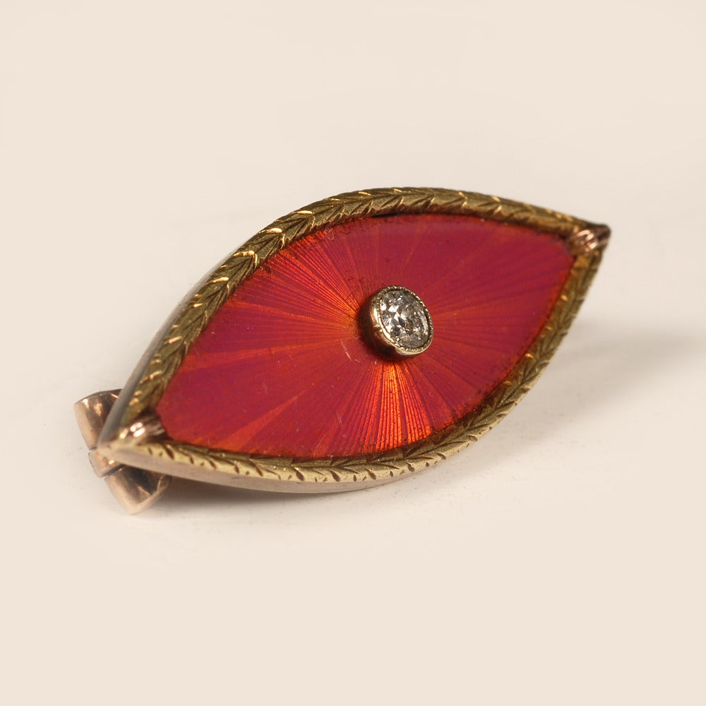 Fabergé jeweled twocolor gold and guilloché enamel brooch by Andrei
