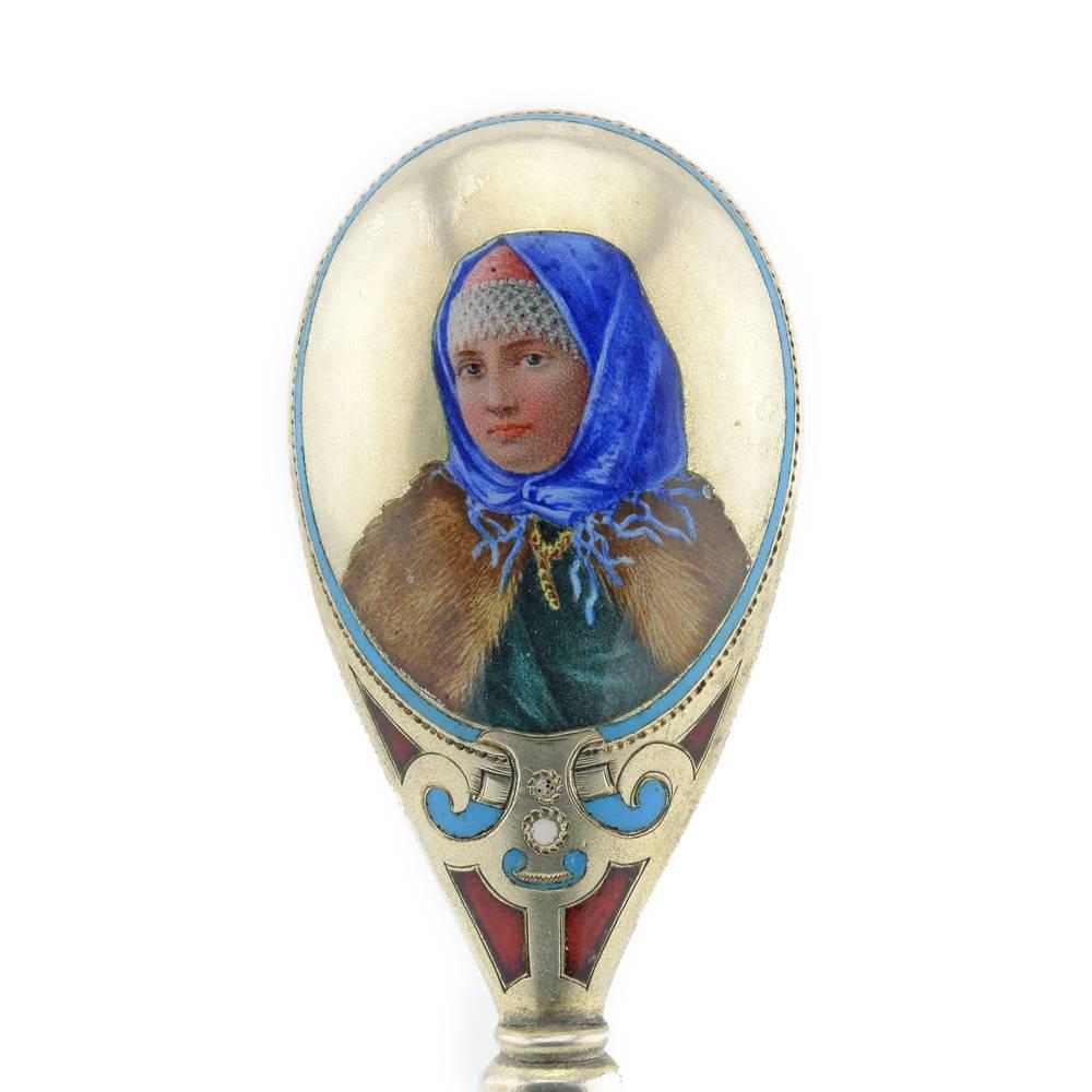 A Russian gilded silver, pictoral, and champlevé enamel spoon, by Imperial court silversmith-jeweler Khlebnikov, Moscow, circa 1890. The spoon in traditional shape of late sixteenth- and seventeenth-century implements, the back of the bowl enameled